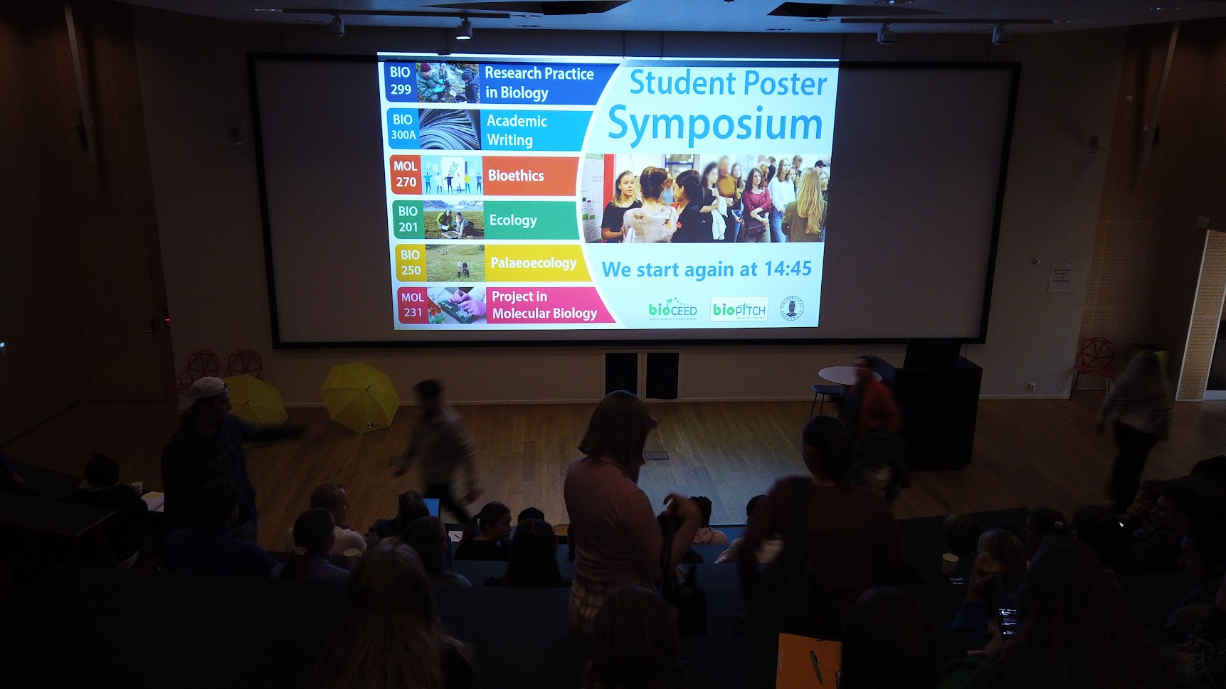 Students gathered at the auditorium for the poster symposium